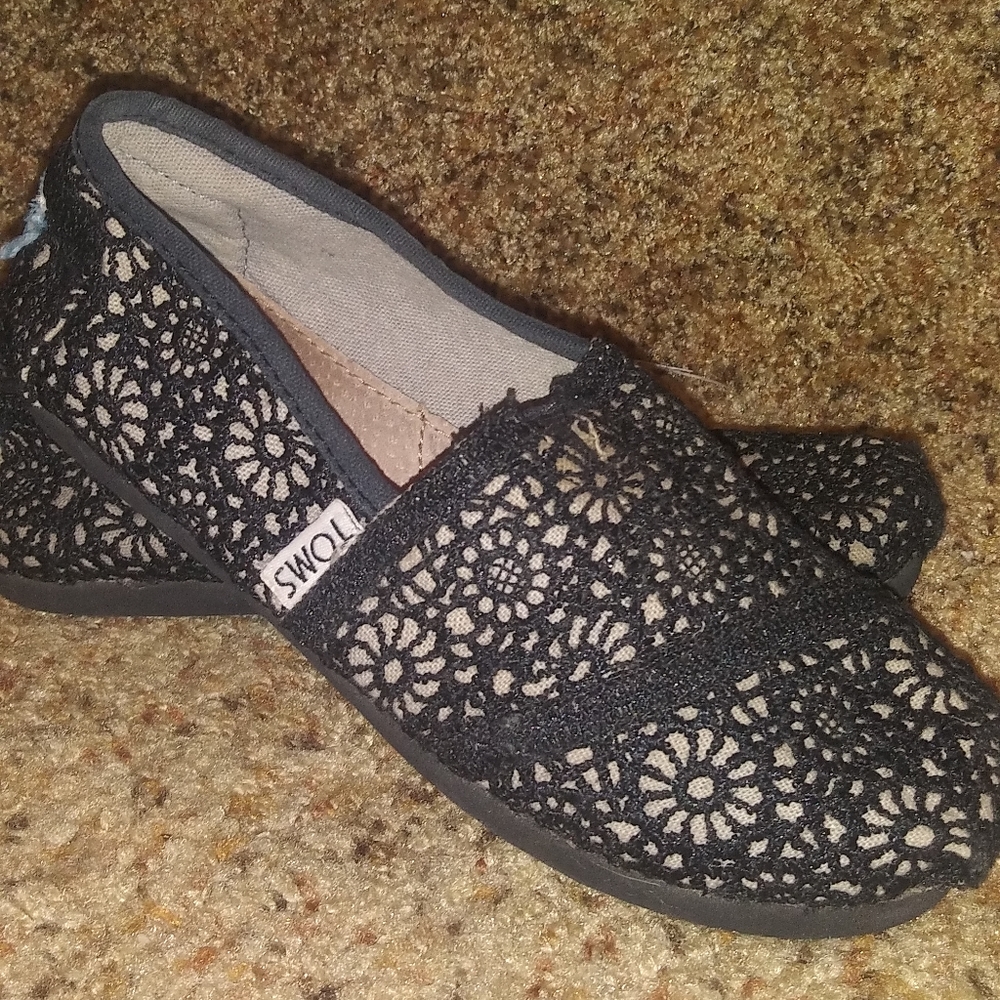 Black crocheted Tom's slip on's